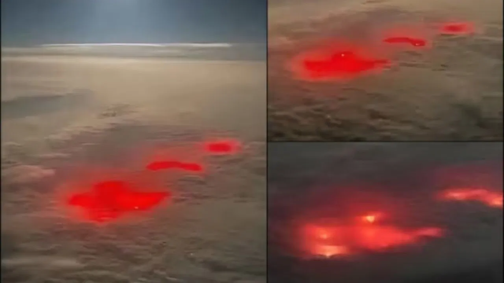 a brilliant red light in the Pacific Ocean.